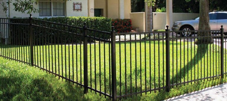 Aluminum Fences Built for Strength, Style & Long‑Term Value - Roark Fencing Black aluminum fence installed by Roark Fencing