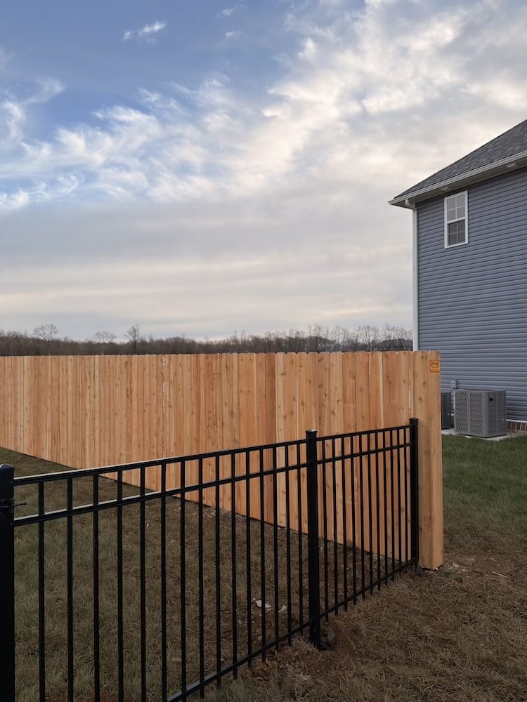 Privacy Fences Built Like They’re Our Own - Roark Fencing Aluminum Fencing and wooden privacy fencing completed by Roark Fencing.